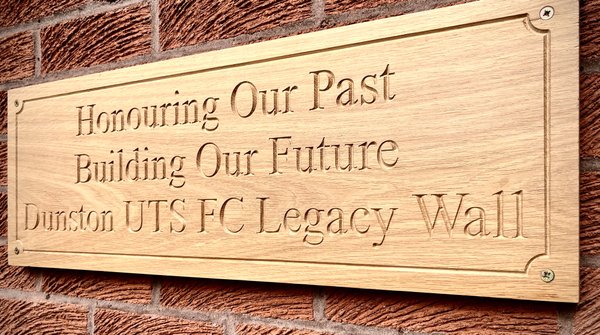 METAL PLAQUE ON OUR LEGACY BRICK WALL