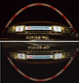 Wembley Stadium lights up