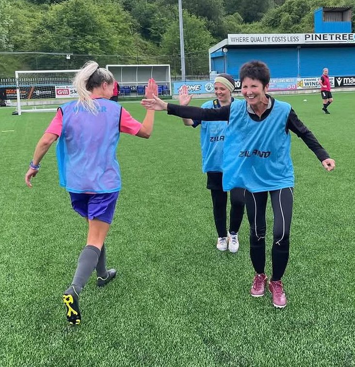 womens vets group - high fives