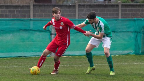 Early Goal Sinks Town