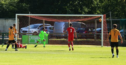 Early Cup Exit For Town