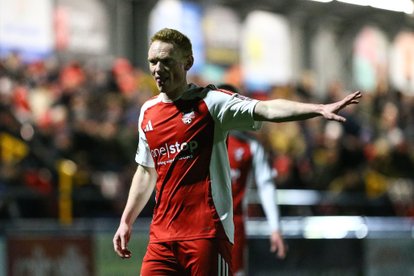 Whitby Town sign Michael Woods on permanent deal