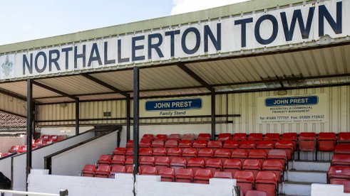 Double Signing Signals Town's Ambitions