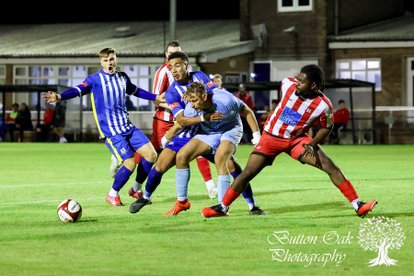 Darlaston Town progressed to the Second Round of the Walsall Senior Cup with a 2-1 home win over Midland Football League Premier Division side Romulus FC.