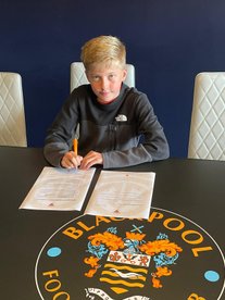 Genesis Lad signs for Blackpool…