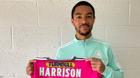 Harrison completes United switch